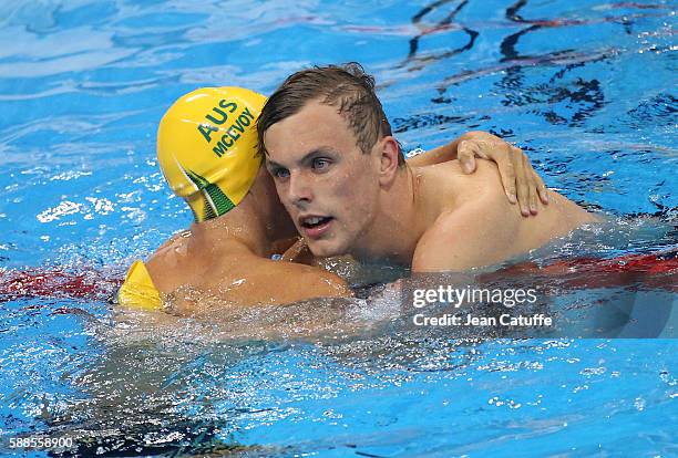 Gold medalist Kyle Chalmers of Australia greets countryman Cameron McEvoy following the Men's 100m Freestyle Final on day 5 of the Rio 2016 Olympic...