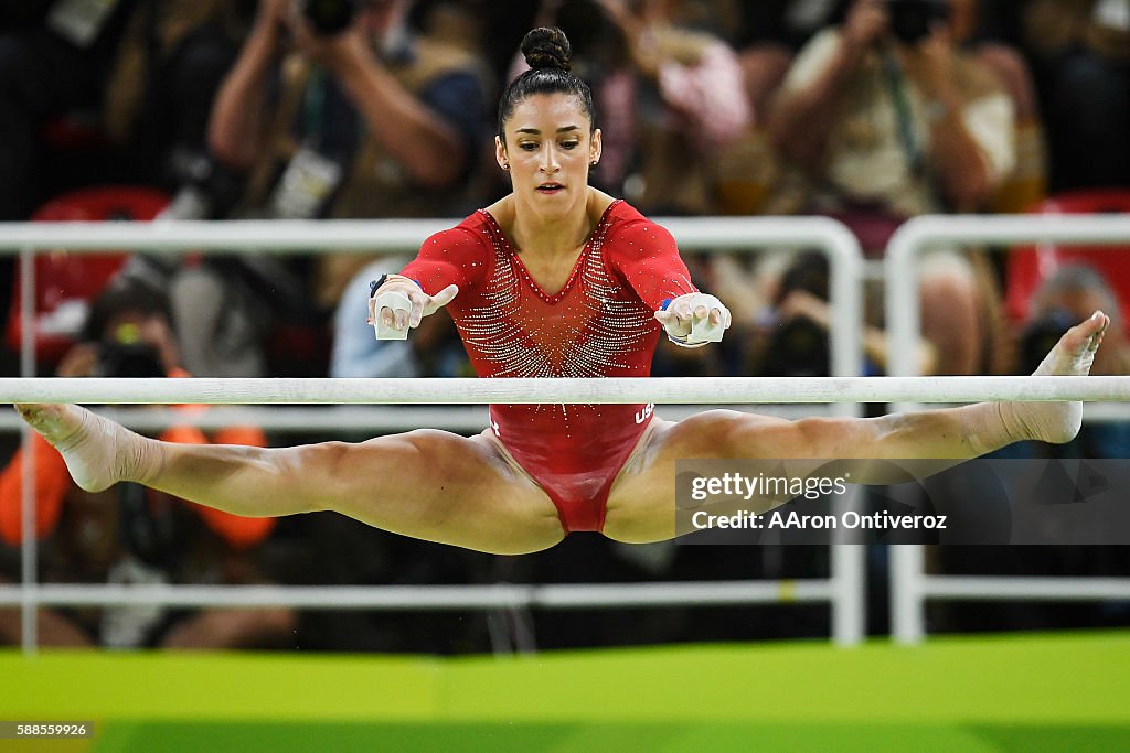 Aly Raisman Statistics Aly Raisman of the United States performs on the uneven bars during ...