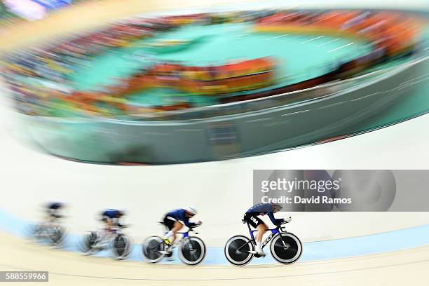 Sarah Hammer, Kelly Catlin, Chloe Dygert and Jennifer Valente of the United States compete in the Women's Team Pursuit Track Cycling Qualifying on...