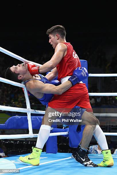 Daniyar Yeleussinov of Kazikstan fights Josh Kelly of Great Britain in their Mens Welterweight bout on Day 6 of the 2016 Rio Olympics at Riocentro -...