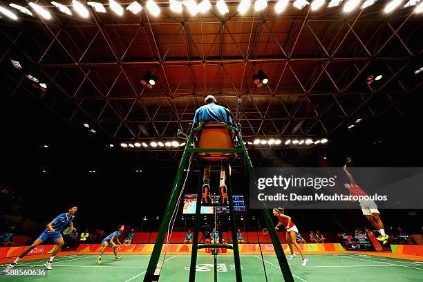 Chris and Gabby Adcock of Great Britain or Team GB compete against Ma Jin and Xu Chen of China in the badminton Mixed Doubles on Day 6 of the 2016...