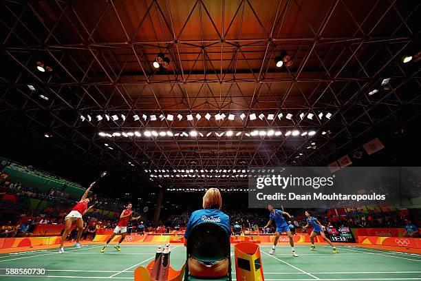 Chris and Gabby Adcock of Great Britain or Team GB compete against Ma Jin and Xu Chen of China in the badminton Mixed Doubles on Day 6 of the 2016...