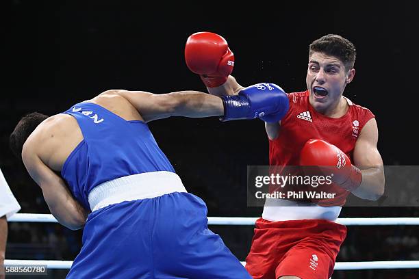 Daniyar Yeleussinov of Kazikstan fights Josh Kelly of Great Britain in their Mens Welterweight bout on Day 6 of the 2016 Rio Olympics at Riocentro -...