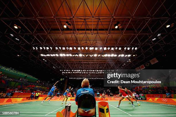 Chris and Gabby Adcock of Great Britain or Team GB compete against Ma Jin and Xu Chen of China in the badminton Mixed Doubles on Day 6 of the 2016...