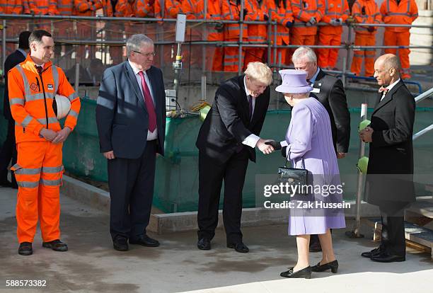 Queen Elizabeth II and Boris Johnson visit the Crossrail Station site at Bond Street in London