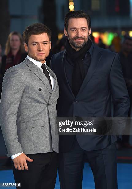 Taron Egerton and Hugh Jackman arriving at the European premiere of Eddie the Eagle at the Odeon Leicester Square in London