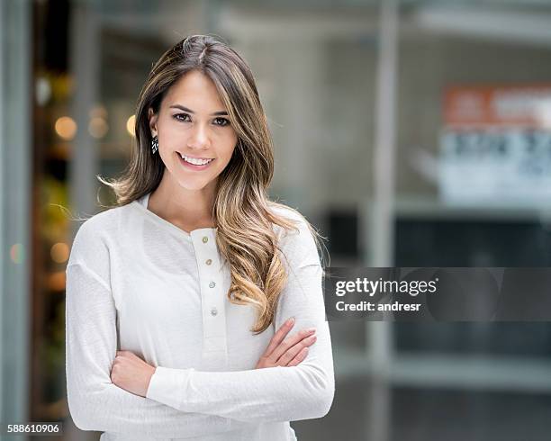 beautiful woman at a shopping center - colombian people stock pictures, royalty-free photos & images