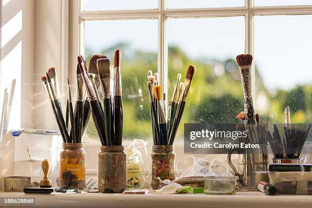 paintbrushes the studio - artist studio stock pictures, royalty-free photos & images