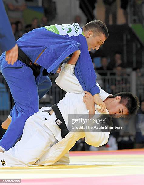 Mashu Baker of Japan and Varlam Liparteliani of Georgia compete in the Men's -90kg Gold Medal bout on Day 5 of the Rio 2016 Olympic Games at Carioca...