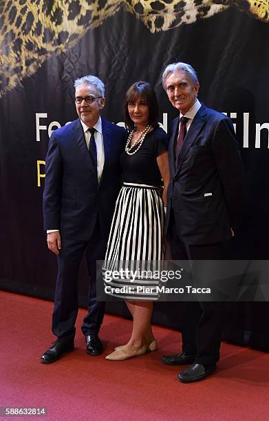 Howard Shore, Elizabeth Cotnoir and Marco Solari attend a photocall during the 69th Locarno Film Festival on August 11, 2016 in Locarno, Switzerland.