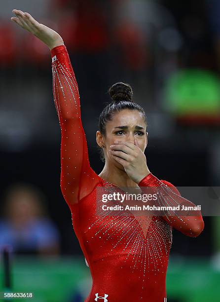 Alexandra Raisman of the United States reacts after competing on the floor during the Women's Individual All Around Final on Day 6 of the 2016 Rio...