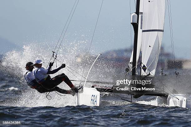 Billy Besson of France and Marie Riou of France compete in the Nacra 17 Mixed class on Day 6 of the Rio 2016 Olympics at Marina da Gloria on August...