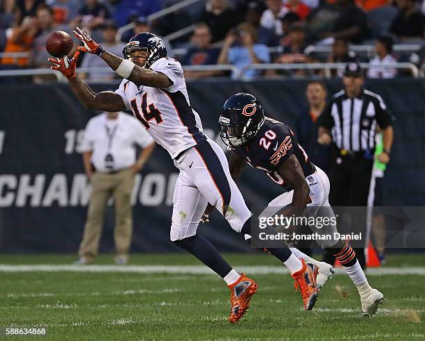 Cody Latimer of the Denver Broncos catches a pass in front of DeVante Bausby of the Chicago Bears at Soldier Field on August 11, 2016 in Chicago,...