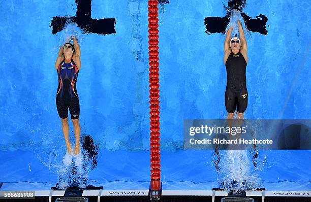 Madeline Dirado of the United States and Katinka Hosszu of Hungary compete in the second Semifinal of the Women's 200m Backstroke on Day 6 of the Rio...