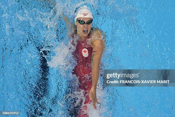 Canada's Hilary Caldwell competes in the Women's 200m Backstroke Semifinal during the swimming event at the Rio 2016 Olympic Games at the Olympic...