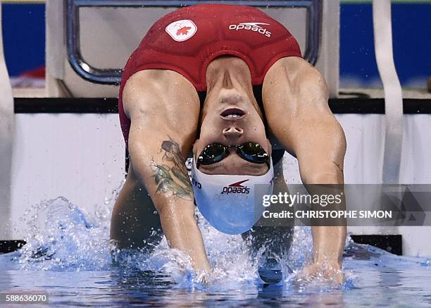 Canada's Hilary Caldwell competes in the Women's 200m Backstroke Semifinal during the swimming event at the Rio 2016 Olympic Games at the Olympic...