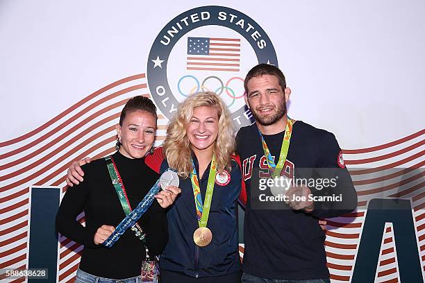 Olympians Marti Malloy, Kayla Harrison and Travis Stevens attend the USA House at the Colegio Sao Paulo on August 11, 2016 in Rio de Janeiro, Brazil.