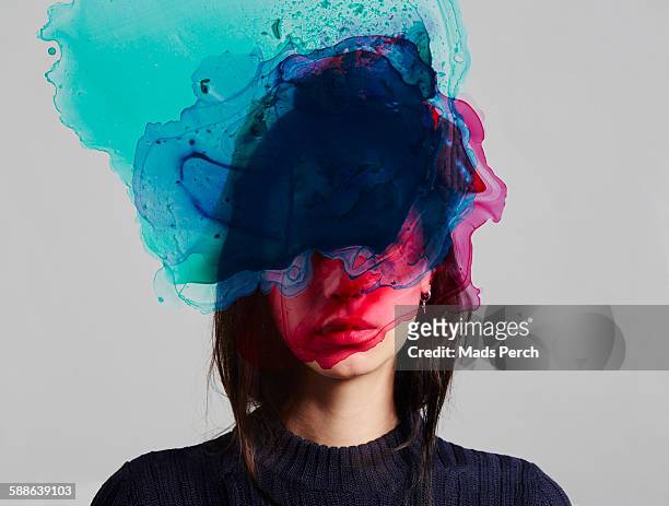 woman with ink over her face - imagination stockfoto's en -beelden