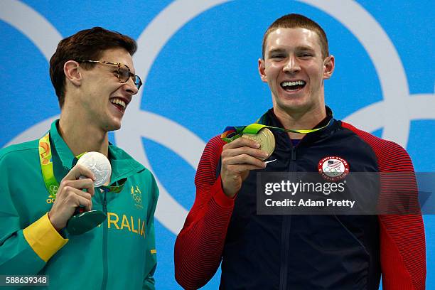 Silver medalist Mitch Larkin of Australia and gold medalist Ryan Murphy of the United States celebrate on the podium after the Men's 200m Backstroke...