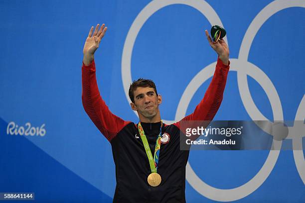 Michael Phelps of the United States celebrates after winning gold medal in the Men's 200m Individual Medley within the Rio 2016 Olympic Games in Rio...