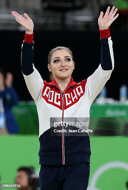 Bronze medalist Aliya Mustafina poses during the medal ceremony for the Women's Individual All-Around on day 6 of the Rio 2016 Olympic Games at Rio...