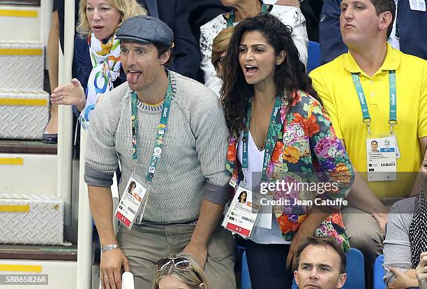 Matthew McConaughey and his wife Camila Alves attend the swimming finals on day 6 of the Rio 2016 Olympic Games at Olympic Aquatics Stadium on August...