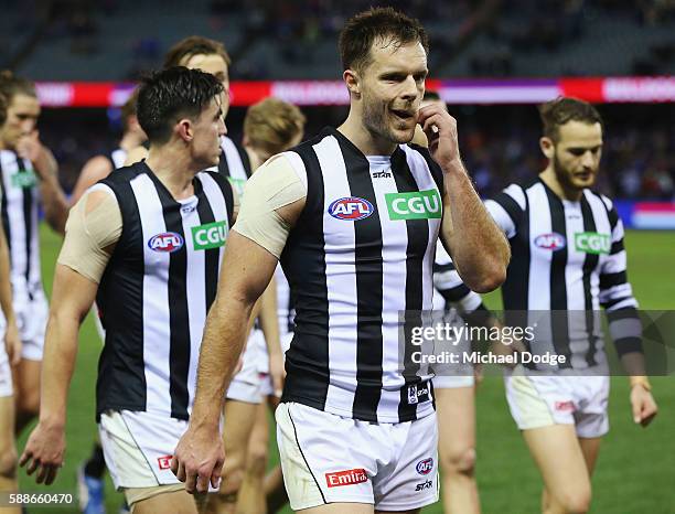 Nathan Brown of the Magpies looks dejected after defeat during the round 21 AFL match between the Western Bulldogs and the Collingwood Magpies at...