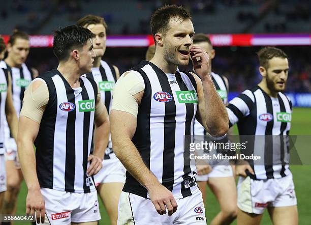 Nathan Brown of the Magpies looks dejected after defeat during the round 21 AFL match between the Western Bulldogs and the Collingwood Magpies at...
