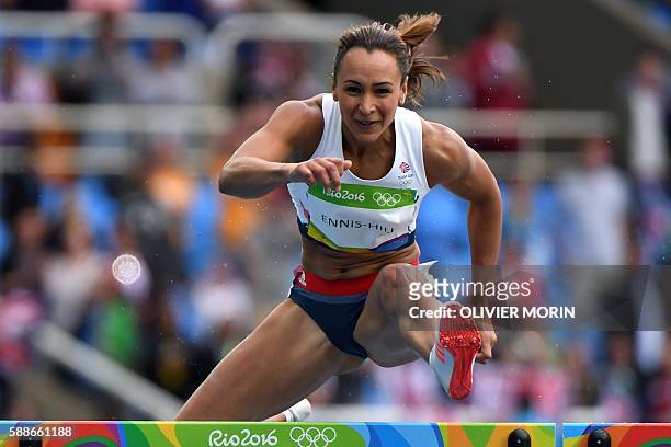 Britain's Jessica Ennis-Hill competes in the Women's Heptathlon 100m Hurdles during the athletics event at the Rio 2016 Olympic Games at the Olympic...