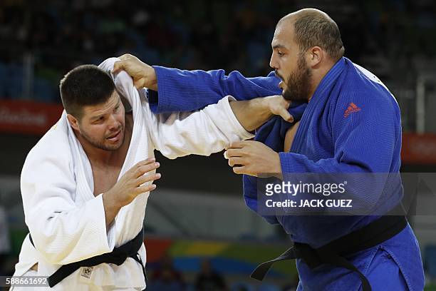 Hungary's Barna Bor competes with Tunisia's Faicel Jaballah during their men's +100kg judo contest match of the Rio 2016 Olympic Games in Rio de...
