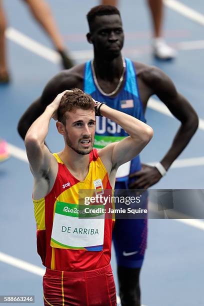 Alvaro de Arriba of Spain and Charles Jock of the United States react after competeing in round one of the Men's 800 metres on Day 7 of the Rio 2016...