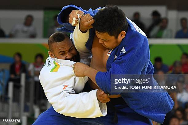 Netherlands' Roy Meyer competes with South Korea's Kim Sungmin during their men's +100kg judo contest match of the Rio 2016 Olympic Games in Rio de...