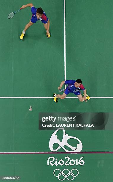 An overview shows South Korea's Yoo Yeon Seong and South Korea's Lee Yong Dae serve to Taiwan's Sheng Mu Lee and Taiwan's Chia Hsin Tsai during their...