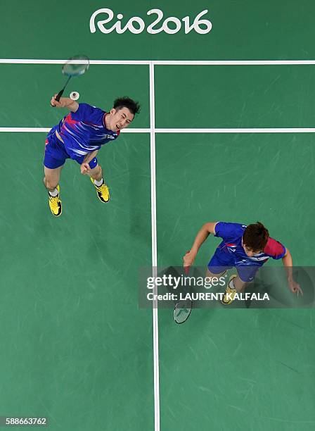 An overview shows South Korea's Yoo Yeon Seong and South Korea's Lee Yong Dae serve to Taiwan's Sheng Mu Lee and Taiwan's Chia Hsin Tsai during their...