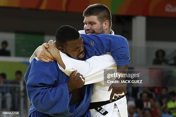 Hungary's Barna Bor competes with Cuba's Alex Garcia Mendoza during their men's +100kg judo contest match of the Rio 2016 Olympic Games in Rio de...