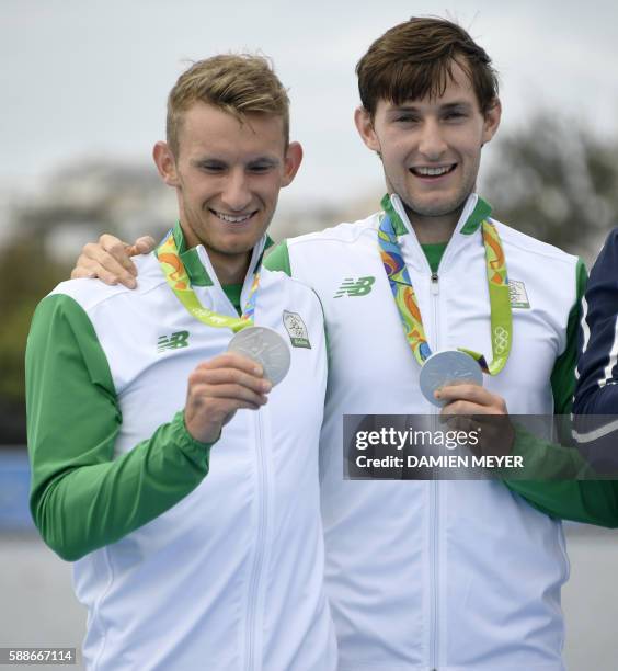 Ireland's Gary O'donovan and Paul O'donovan pose with their medals on the podium of the LWT Men's Double Sculls final rowing competition at the Lagoa...