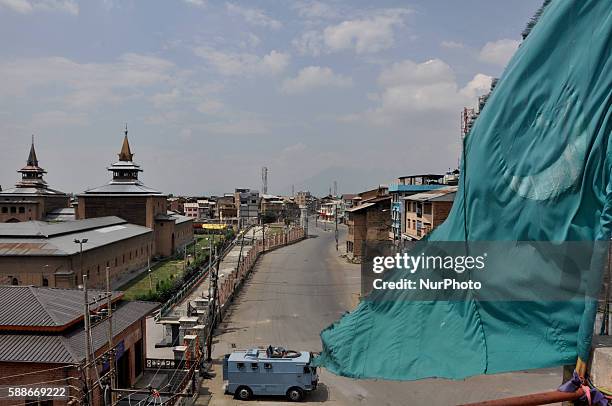 Deserted view of a Srinagar street during a curfew in Srinagar on August 11,2016.protests have entered second month in Indian-Controlled Kashmir...
