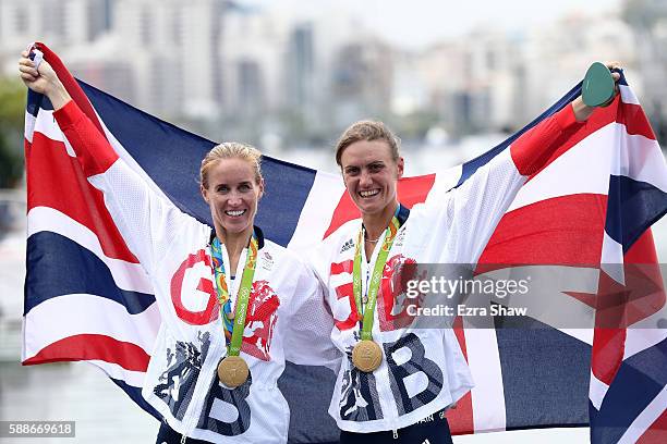 Gold medalists Helen Glover and Heather Stanning of Great Britain pose for photographs after the medal ceremony for the Women's Pair on Day 7 of the...