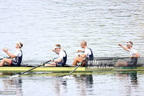 Alex Gregory, Mohamed Sbihi, George Nash and Constantine Louloudis of Great Britain celebrate winning the gold medal in the Men's Four Final A on Day...