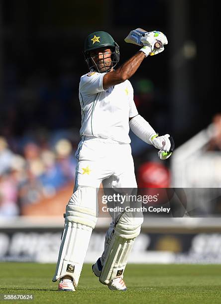 Asad Shafiq of Pakistan celebrates reaching his century during day two of the 4th Investec Test between England and Pakistan at The Kia Oval on...