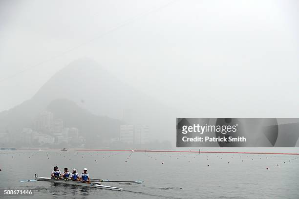 Dionysios Angelopoulos, Ioannis Tsilis, Georgios Tziallas and Ioannis Christou of Greece react after the Men's Four Final B on Day 7 of the Rio 2016...
