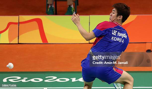 Yong Dae Lee and Yeon Seong Yoo of Republic of Korea competes against Sheng Mu Lee and Chia Hsin Tsai of Taipei in the badminton Men's Doubles Group...