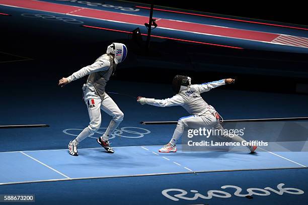 Andrea Baldini of Italy competes against Jeremy Cadot of France during a Men's Foil Team Semifinal bout on Day 7 of the Rio 2016 Olympic Games at...