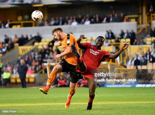 James Henry of Wolverhampton Wanderers and Enzio Boldewijn of Crawley Town during the EFL Cup match between Wolverhampton Wanderers and Crawley Town...