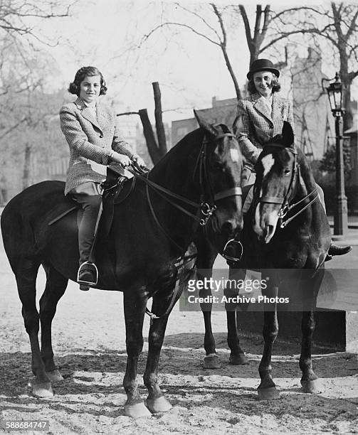 Patricia Kennedy , later Patricia Kennedy Lawford, and Kathleen Kennedy , later Kathleen Cavendish, Marchioness of Hartington, riding in Rotten Row,...