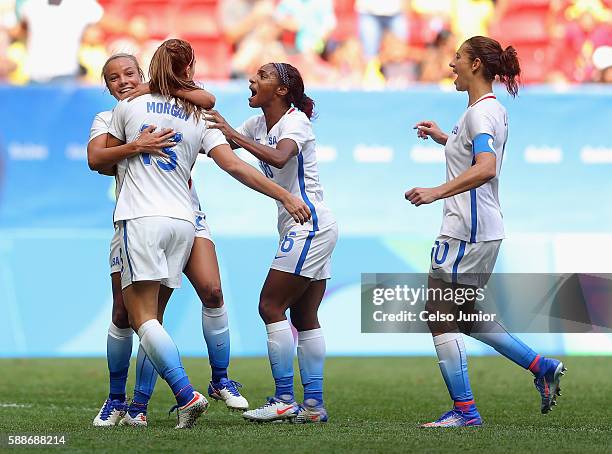 Alex Morgan of United States celebrates her goal to tie the game with teammates Mallory Pugh, Crystal Dunn and Carli Lloyd in the second half against...