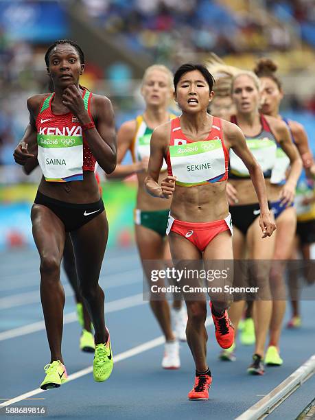 Hanami Sekine of Japan and Betsy Saina of Kenya compete in the Women's 10,000 metres final on Day 7 of the Rio 2016 Olympic Games at the Olympic...