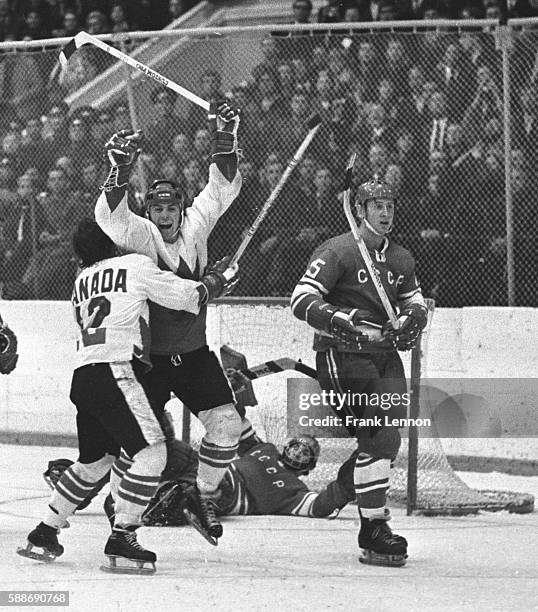 Yvan Cournoyer hugs Paul Henderson after Henderson's goal won the eight-game Summit Series against the Soviet Union on Sept. 28, 1972. Frank...