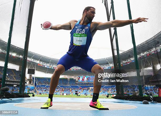 Andrew Evans of the United States competes in the Men's Discus qualification on Day 7 of the Rio 2016 Olympic Games at the Olympic Stadium on August...