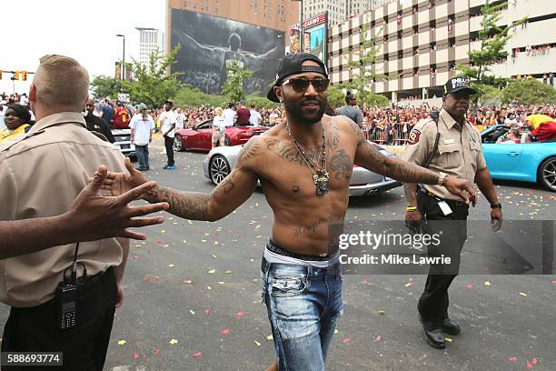 Mo Williams of the Cleveland Cavaliers greets fans during the Cleveland Cavaliers 2016 NBA Championship victory parade and rally on June 22, 2016 in...